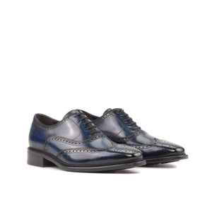 Denim Blue Hand painted Patina Calf Crust Leather Goodyear Welted Wingtip Oxford Brogue Lace up Dress Shoes. Leather sole with Rubber mountain injections and stacked leather heel