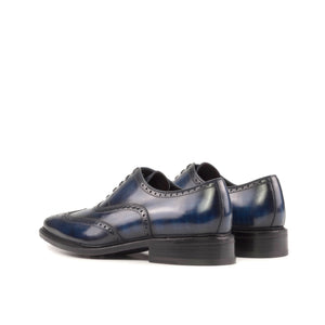 Denim Blue Hand painted Patina Calf Crust Leather Goodyear Welted Wingtip Oxford Brogue Lace up Dress Shoes. Leather sole with Rubber mountain injections and stacked leather heel