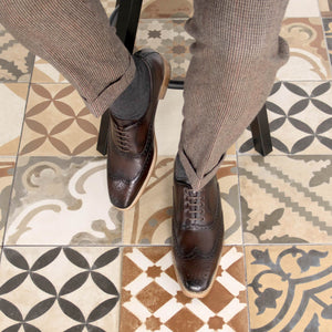 Man wearing Wingtip Made in Spain Goodyear Welted Oxford brogues in Dark Brown Colour