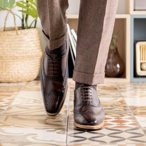 Man wearing Wingtip Made in Spain Goodyear Welted Oxford brogues in Dark Brown Colour
