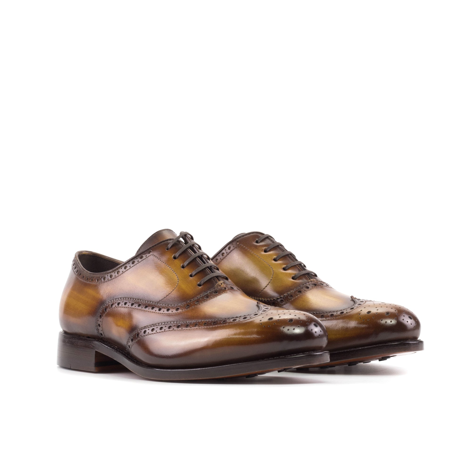 Wingtip Full Brogue in handprinted patina calf crust leather in cognac colour and Leather sole